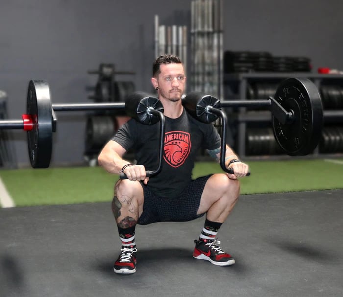 American Barbell Safety Squat Bar SB-SSB with an athlete