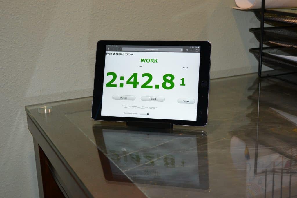 The Fit At Midlife Free Workout Timer works great with an iPad and tablet stand to make a great, low-cost gym, fitness, or exercise timer.