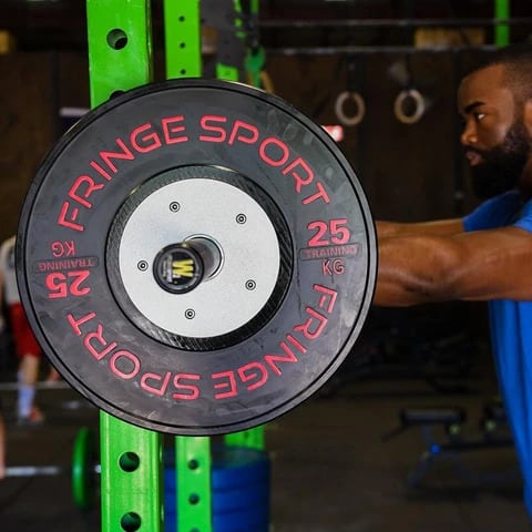 Fringe Sport Black Training Competition Plates - Kilos with a model 1