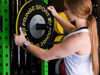 Fringe Sport Black Training Competition Plates - Kilos with a model