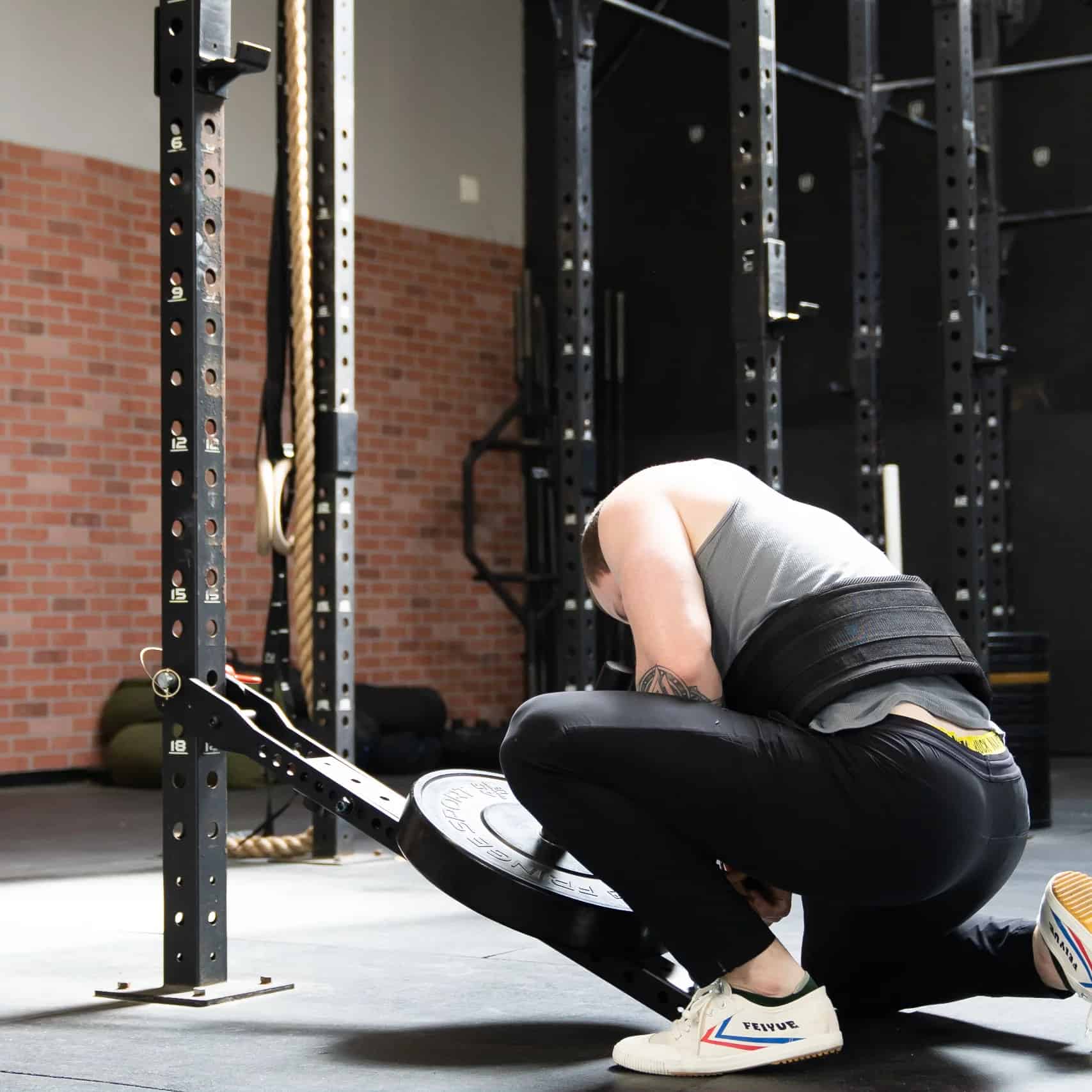 Fringe Sport Mammoth Belt Squat with an athlete 2