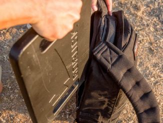 GORUCK 30lb ruck plate going into a rucksack