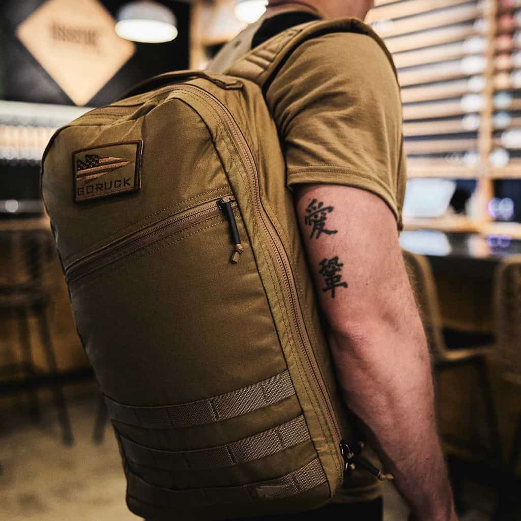 GORUCK Bullet Ruck - Laptop Compartment coyote brown worn by an athlete