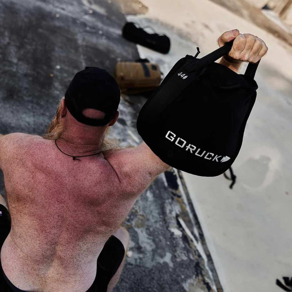 GORUCK Sand Kettlebells 44lbs with an athlete 2