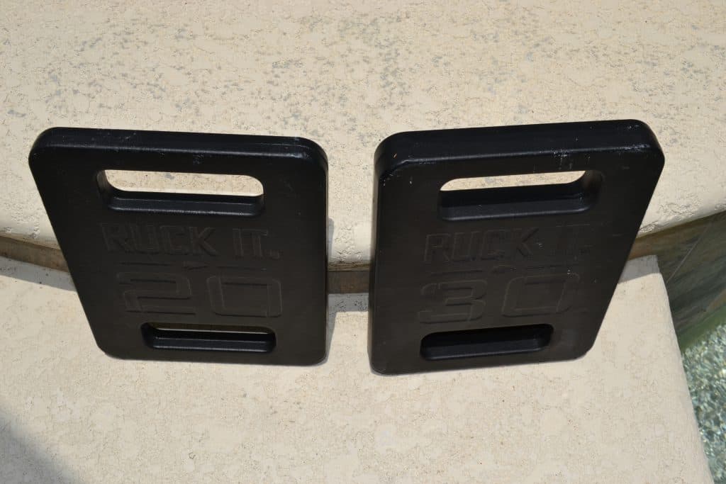 GORUCK Ruck Plates - a 20 Lb Plate and 30 Lb Plate side by side. Notice the 30 lb plate is same height and width, but thicker.