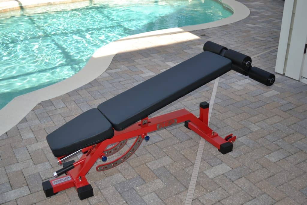 REP AB-5000 Adjustable FID Bench in decline mode using the optional leg attachment accessory.