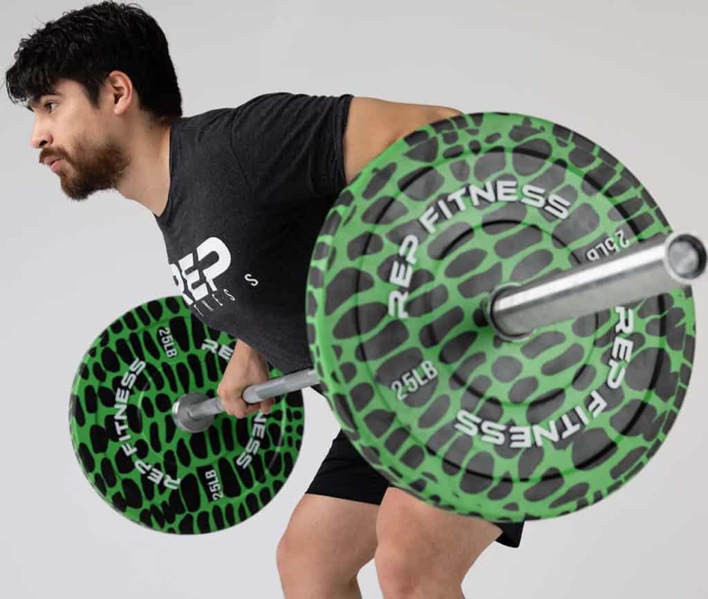 Rep Fitness Animal Print Bumper Plates with an athlete