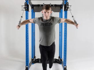 Rep Fitness Ares Cable Attachment (6-Post Series Pre-Order) with an athlete 2