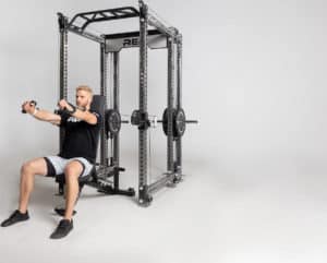 Rep Fitness Athena Plate-Loaded Side-Mount Functional Trainer with an athlete 3
