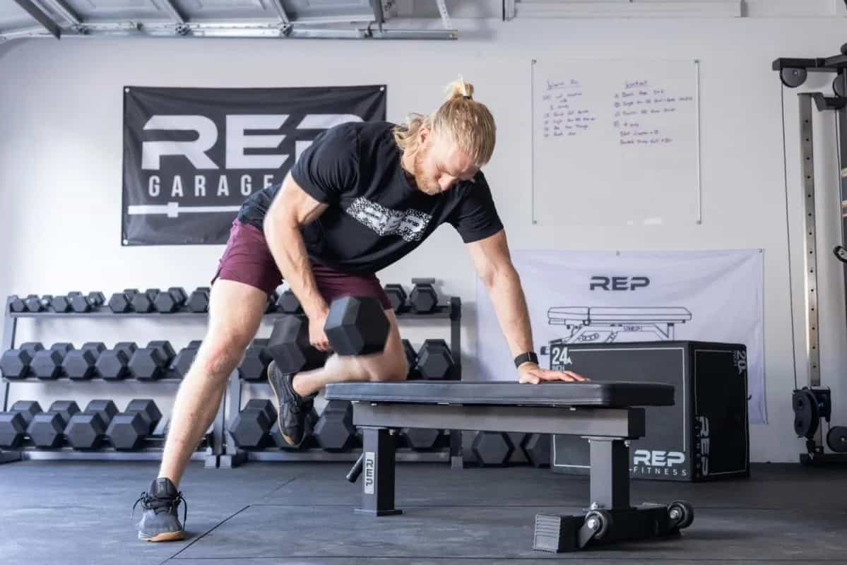 Rep Fitness FB-4000 Comp Lite Bench with a user 3