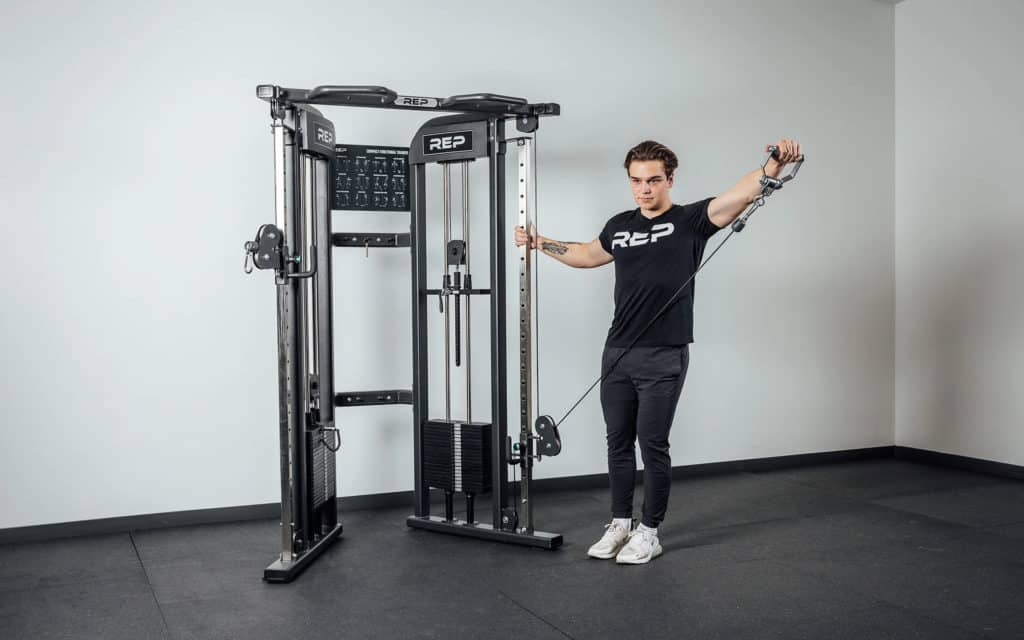 Rep Fitness FT-3000 Compact Functional Trainer 2.0 with an athlete 10