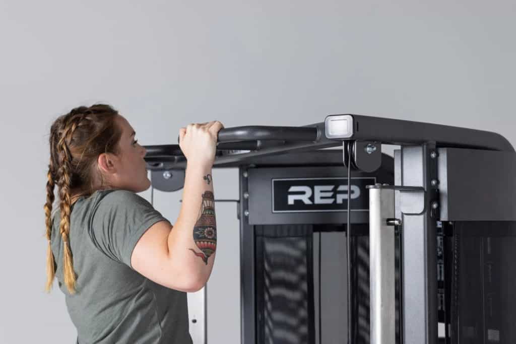 Rep Fitness FT-3000 Compact Functional Trainer with an athlete 6