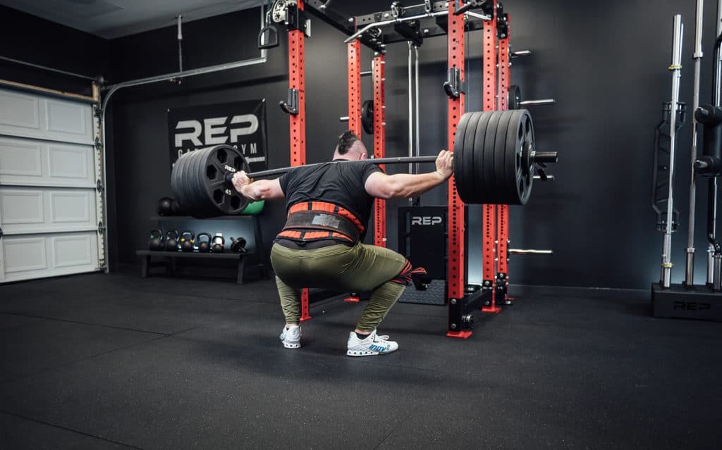 Rep Fitness Helios Squat Bar with an athlete