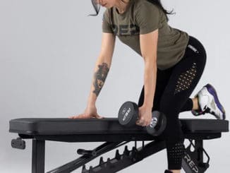 Rep Fitness Rep AB-4100 Adjustable Weight Bench black with an atlete 5