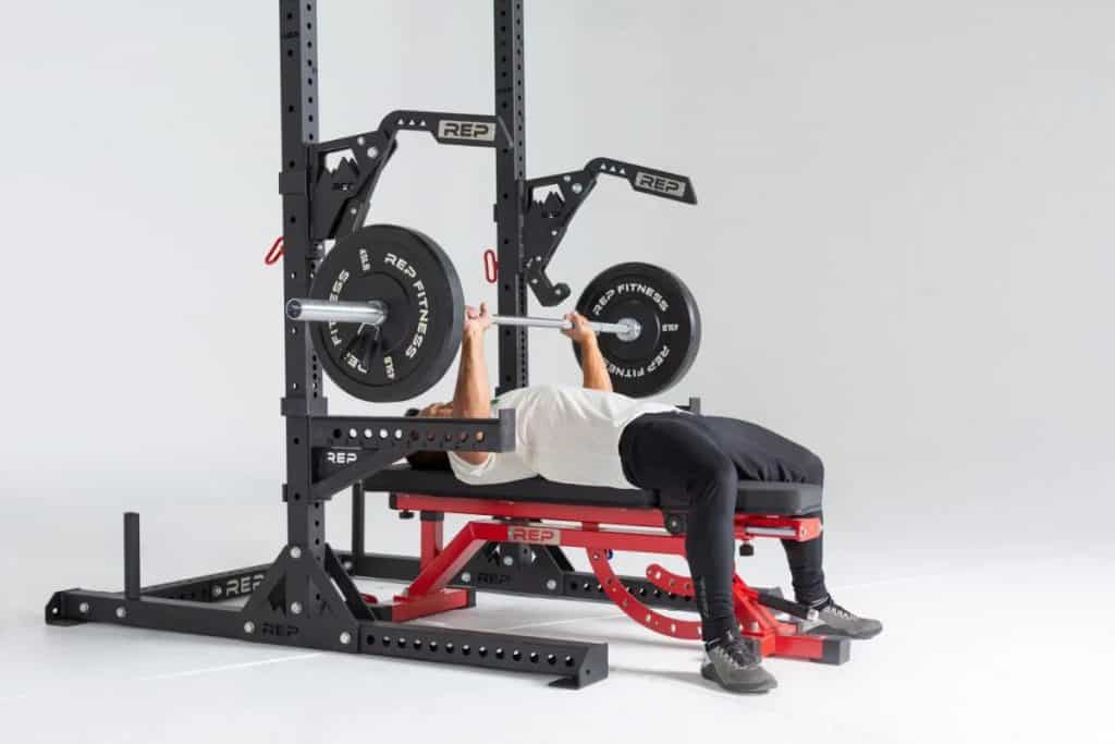 Rep Fitness SR-4000 Squat Rack to lift barbell side view