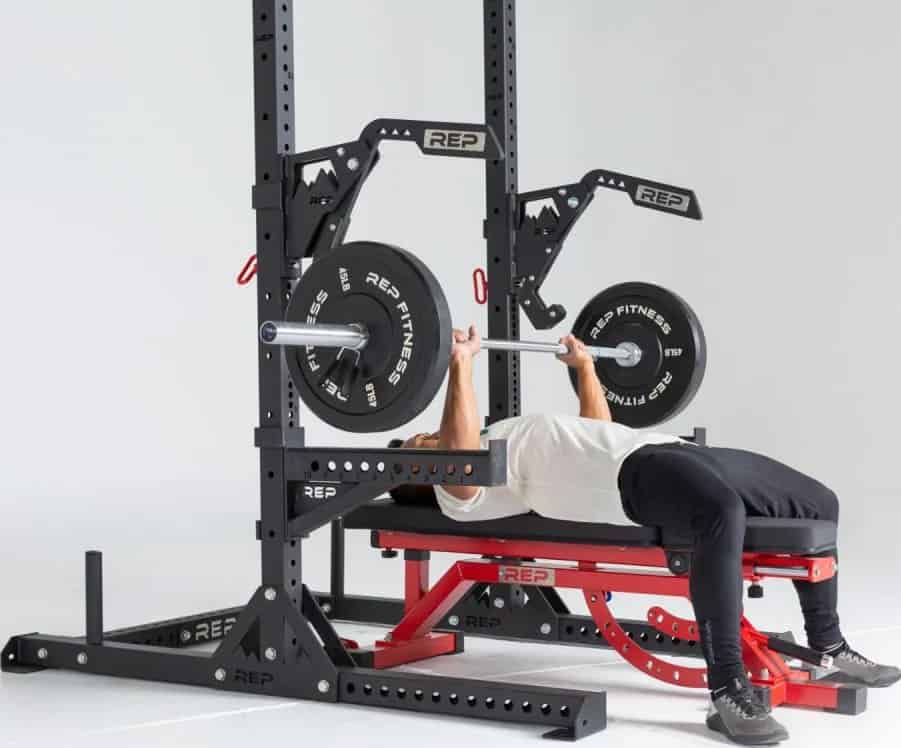 Rep Fitness SR-4000 Squat Rack to lift barbell side view-crop