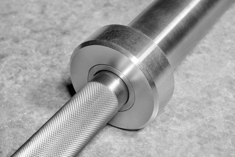 Close-up of the bushings in the Rep Fitness Stainless Steel Power Bar v2