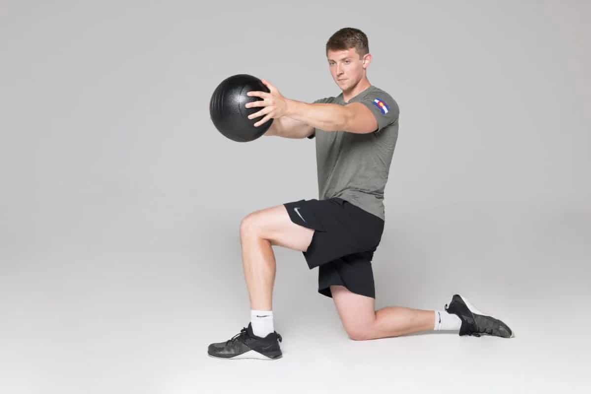 Rep Fitness V2 Slam Balls lunge man