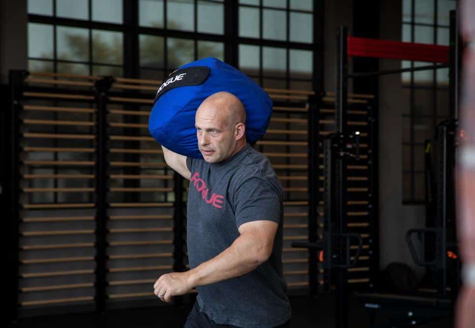 Rogue Color Strongman Sandbags with a model 2