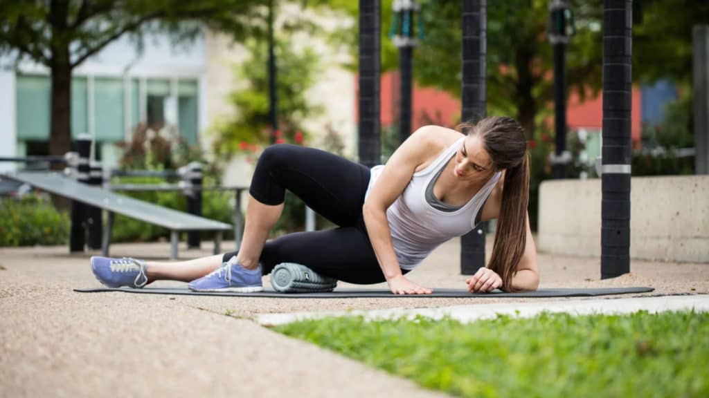 Rogue Core Foam Roller with an athlete