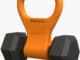 Rogue Fitness Kettle Gryp orange on a dumbbell