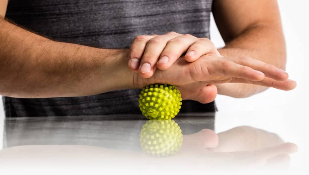Rogue MobiPoint Massage Ball with an athlete 3