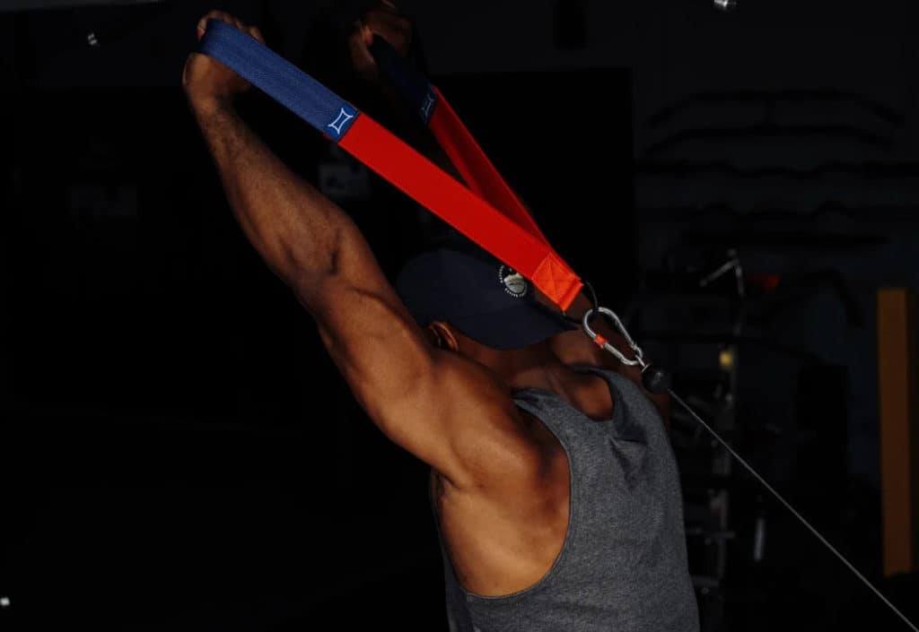 Rogue Sling Shot Tricep Shake Strap with a user 2