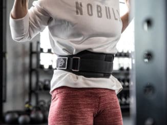 Rogue Toomey USA Nylon Lifting Belt with a user