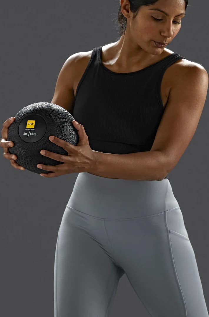 TRX Rubber Medicine Ball with an athlete
