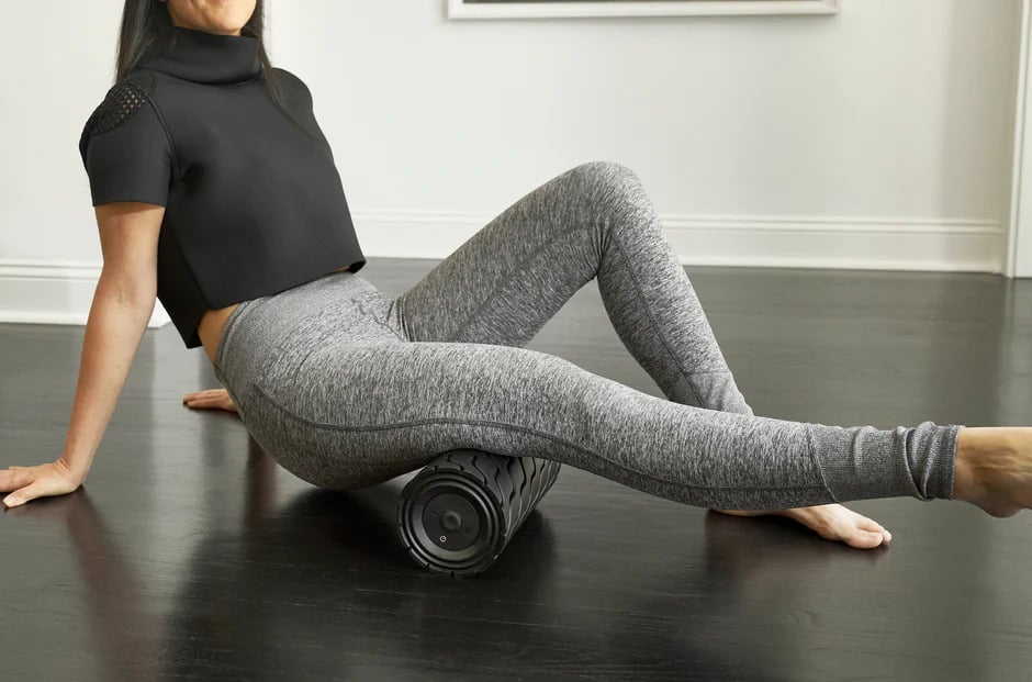 Torque Fitness Theragun Wave Roller with an athlete 2