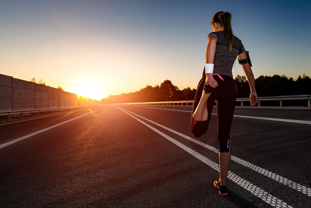 stretching run runner road jogging clothes flare sunset street fitness cross sunbeam success running sportswear