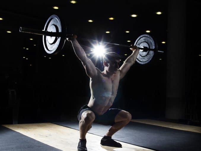 Performing a snatch - one of the olympic lifts