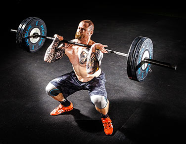 The Front Squat exercise, using a barbell.