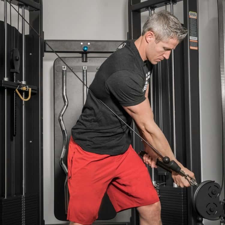 The big benefit of the functional trainer machine? Do movements such as the chop and train your core and anti-rotation work.