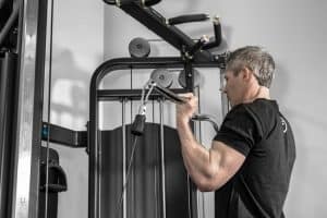 Full body workout is possible with a cable machine like a functional trainer or cable crossover - as long as you have the right attachments. Here is a biceps curl.