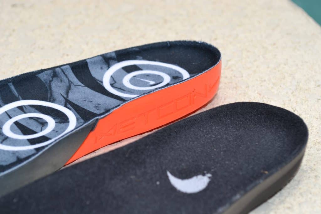 Drop-in midsole - the Nike Metcon 5 (orange) has higher sides as compared to the Nike Metcon 4 XD