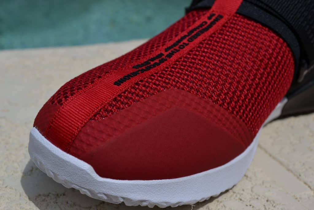 red nike slip on shoes