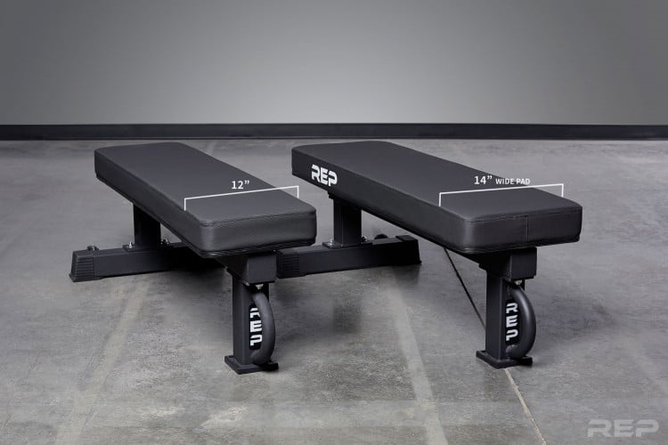 The Rep FB-5000 competition bench has a narrow pad and wide pad option.  Both are 4 inches thick and will help with heavy benching.