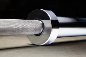 The new stainless steel version of our 20KG Rogue Ohio Bar is machined and assembled in Columbus, Ohio, and features a 200,000 PSI tensile strength shaft, chrome sleeves, and an exclusive Rogue knurl pattern that’s 100% in its original, machined form for an unmatched feel. With quality composite bushings and dual knurl marks, the Stainless Steel Ohio Bar is optimized for both Olympic lifts and Powerlifting—delivering a firm but non-abrasive grip, a consistent spin, and a unique balance of whip and rigidity.