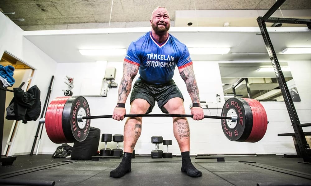 Power bars have aggressive knurl - so you can hang on to the bar better while doing heavy deadlifts. 