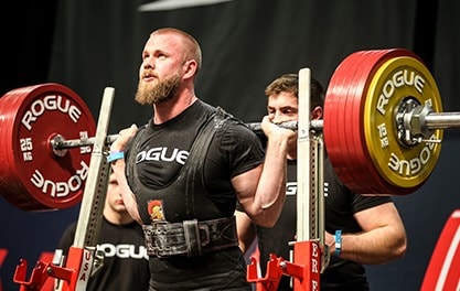 A power bar is commonly used for powerlifting - it's a thicker bar than normal (29mm) with no flex or whip and includes center knurl.