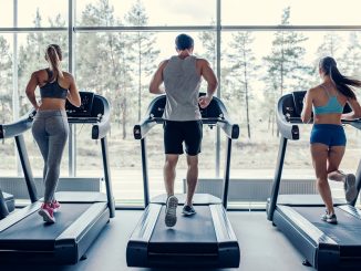 Treadmill in a gym - running on the treadmill is one way to improve physical fitness in the gym or at home.